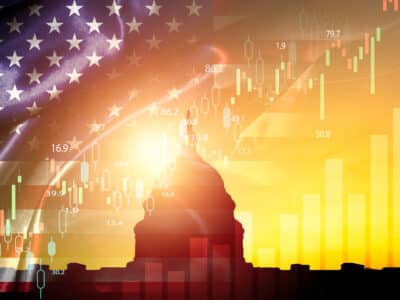 Silhouette of White House with united state of America flag and stock market chart for USA election president related with economy and investment concept.
