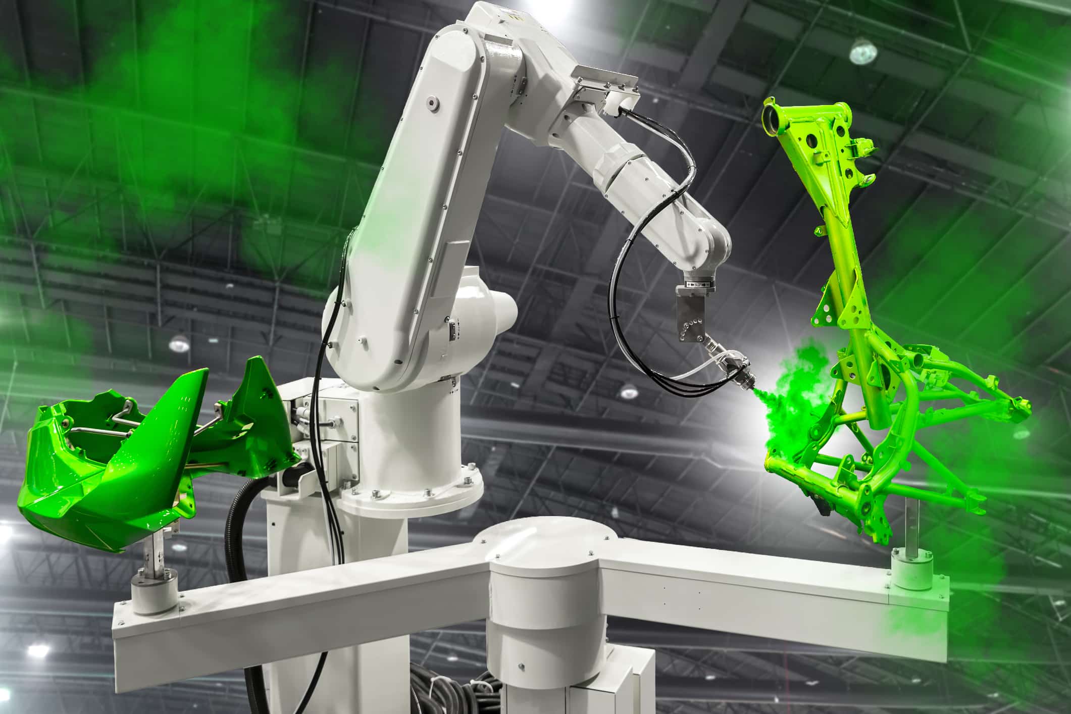 Robotic arm painting spray to the automotive part. High-technolo