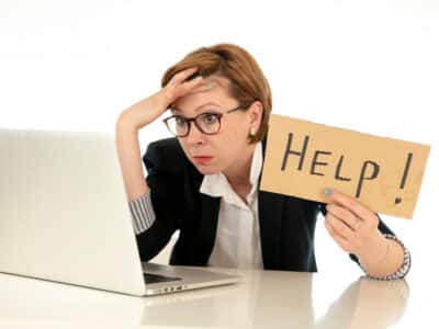 Beautiful,Young,Red,Haired,Caucasian,Tired,And,Frustrated,Business,Woman