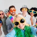 Diverse,Colleagues,In,Festive,Accessories,Smiling,Together,For,A,Celebratory