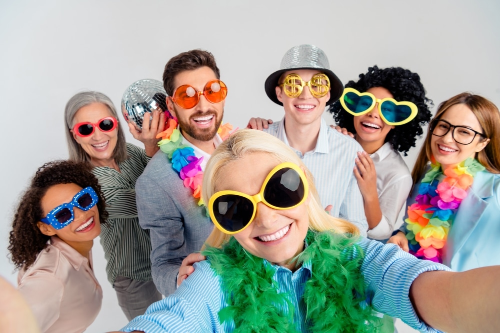 Diverse,Colleagues,In,Festive,Accessories,Smiling,Together,For,A,Celebratory