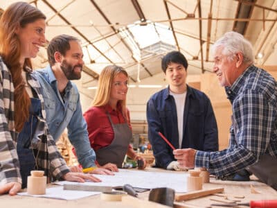 Master,In,The,Training,Of,Carpenters,Apprentices,At,A,Meeting